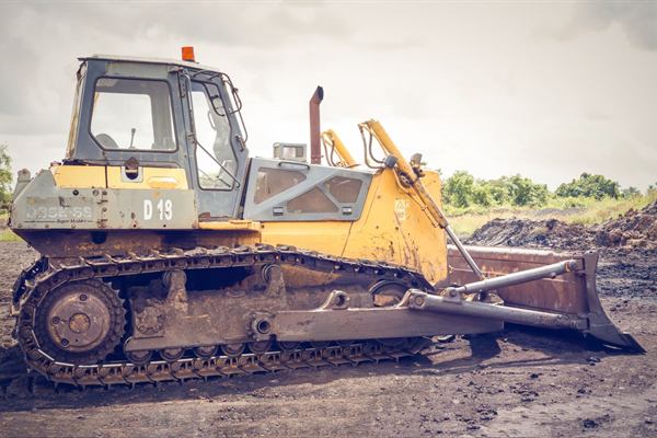 Yellow bulldozer on a work site