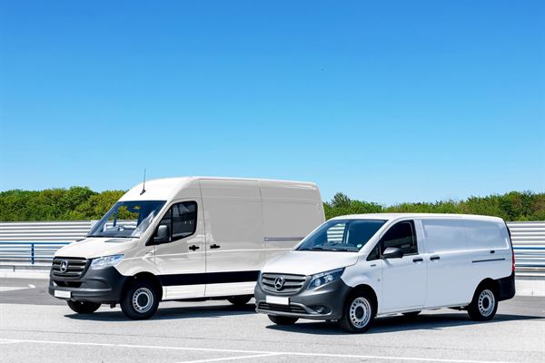 Two white cargo vans